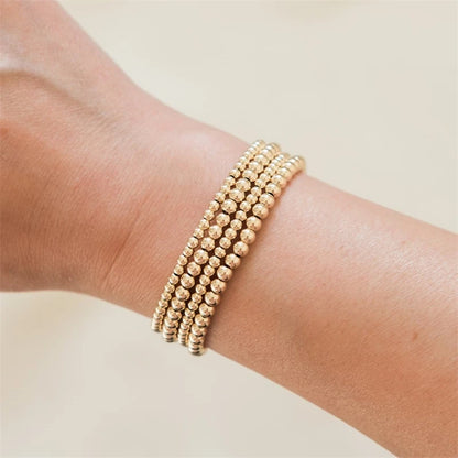 Omega Gold Bead Bracelet