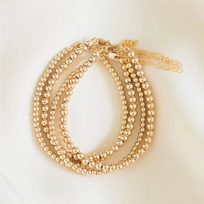 Omega Gold Bead Bracelet