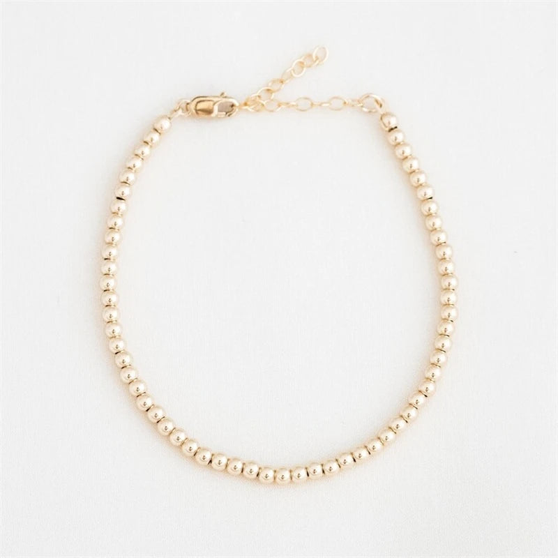 Omega Gold Bead Bracelet