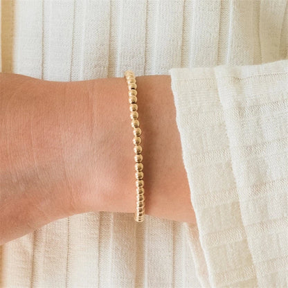 Omega Gold Bead Bracelet